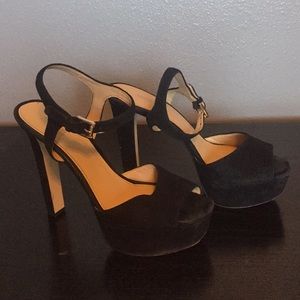 Black suede pumps